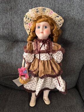 Vintage Porcelain Doll in Floral Prairie Dress and Crochet Hat